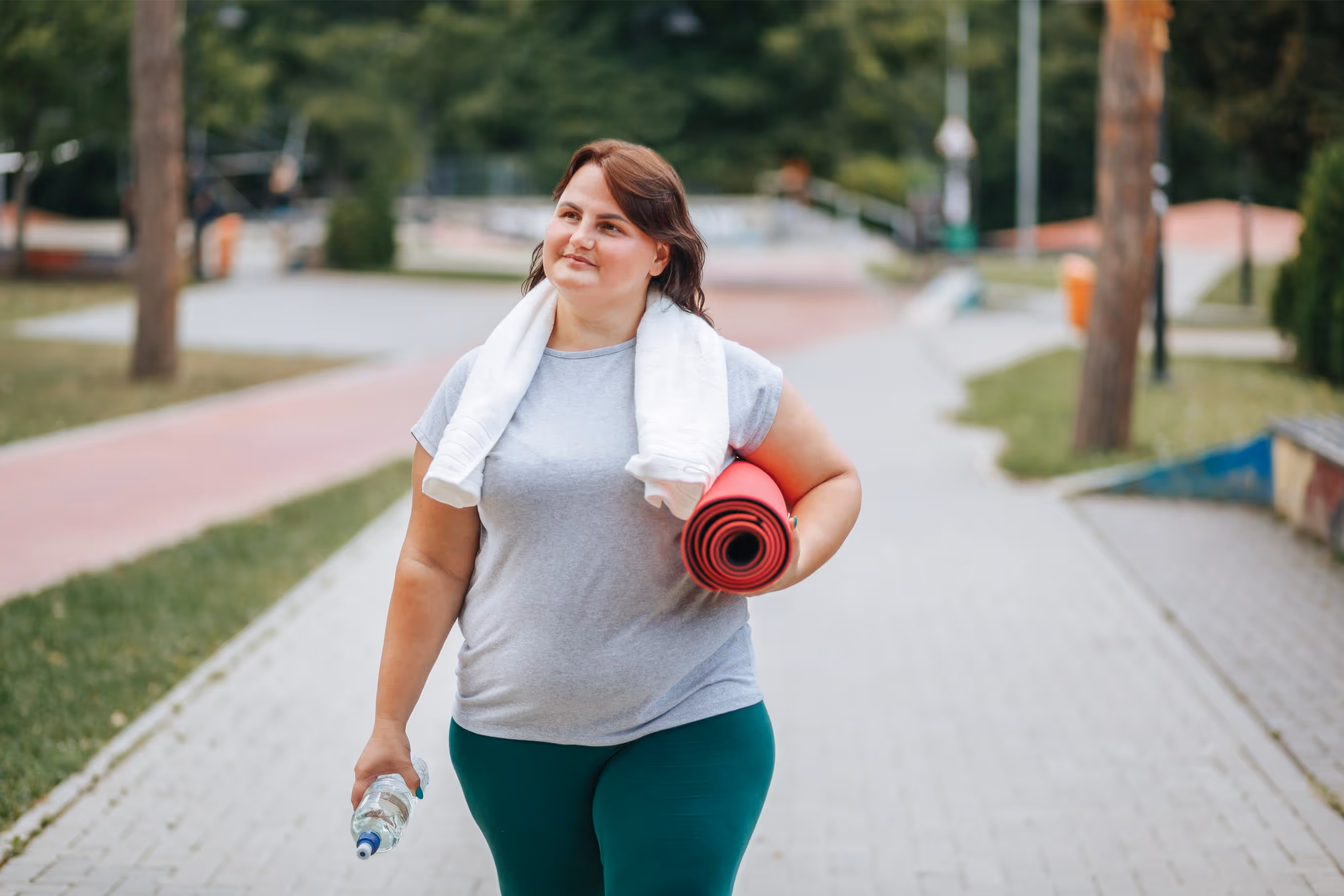 Obese woman doing exercise 
